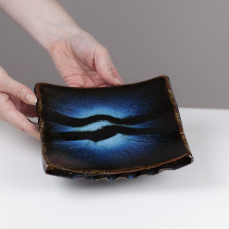 Square Dish on Raised Feet. 56 By James Hake