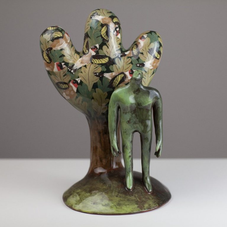 Man watching a charm of goldfinches by Jenny Southam